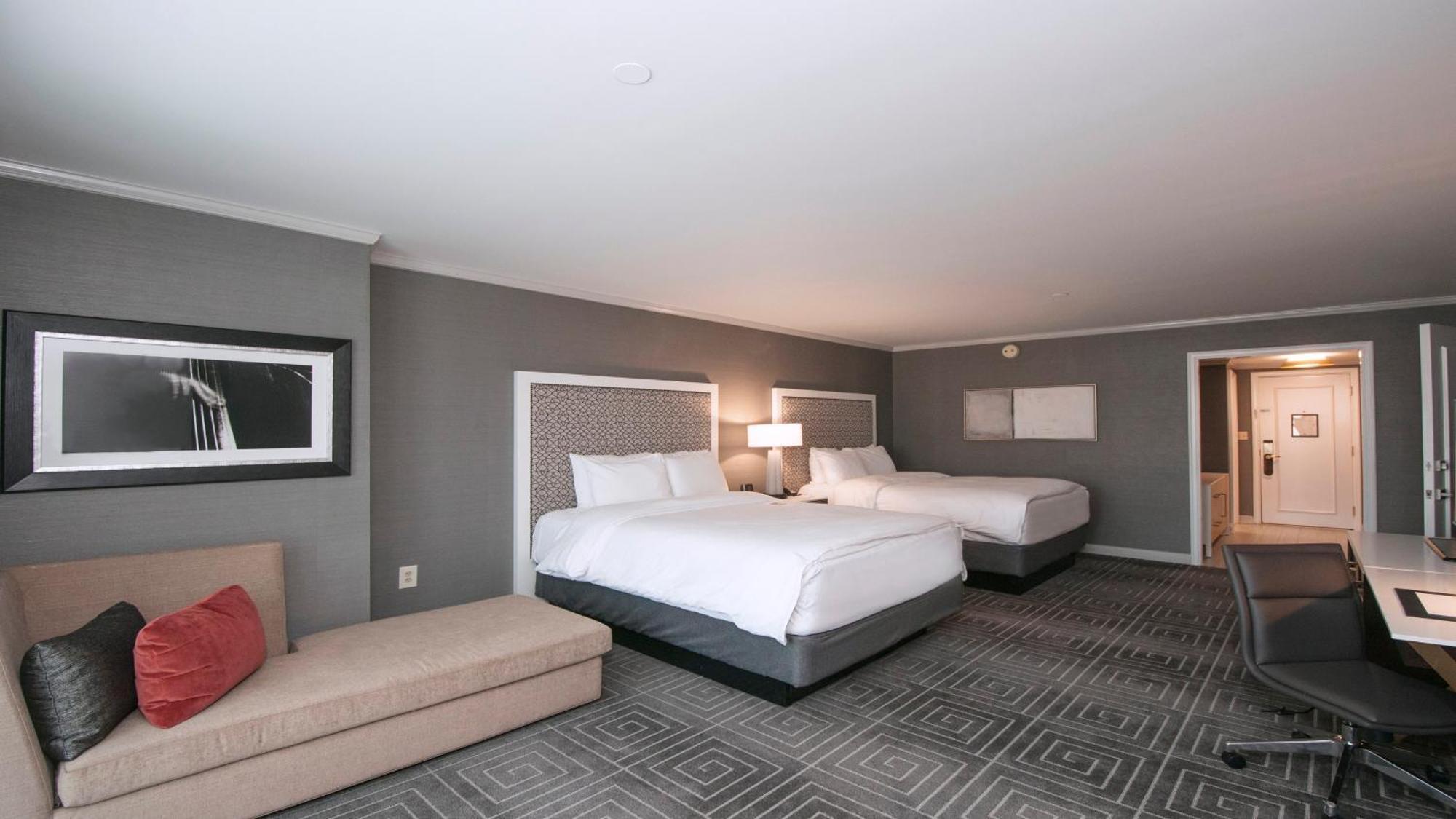 Premium Queen Room Two Queen Beds Sofa Bed Balcony or Plaza View